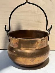 This vintage copper cauldron is a true gem for collectors of metalware. Its unique hammered kettle design and hanging...