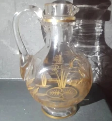 Flacon Daum ancien au décor de nénuphar et grenouilles Non estampillé  Datant fin 19eme début 20eme  Petit éclat...