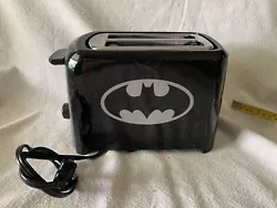 This toaster looks new barely used. Not sure if you can see the Batman emblem inside the toaster compartment. It will...