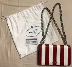 New Prada Saffiano Leather Handbag. Red and white striped, convertible metal chain for shoulder bag or crossbody bag...