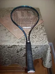 GREAT RACQUET WELL STRUNG LONGER FOR MORE POWER. EXCELLENT CONDITION.