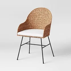 •Upholstered dining chair adds comfy style to your home •Features woven, curved back and arms •Metal frame...