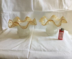 Lot de 2 tulipes en verre bord jaune en très bon état. Envoi soigné en colissimo.