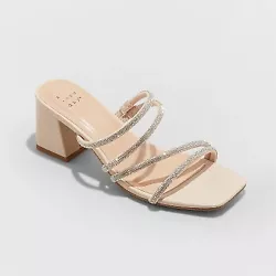 •Light beige mule heels •Memory foam insole •Open-toe and back design •Rhinestone-embellished straps •2.25in...