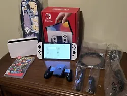 For sale is a used Nintendo Switch OLED Model. This was used mainly for a month or so to play through Mario Odyssey but...