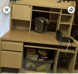desk with drawers and hutch. Couple of worn spots on wood. Pick up only. Need to verify height etc