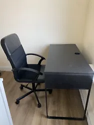 Black Wood Desk with drawer and side shelving cabinets. Features hole for cables. Very sturdy. Comfy and tall back.