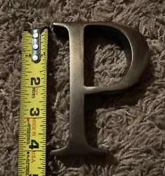 Add a touch of elegance to your home with this beautiful bronze metal letter “P”. Measuring 4 inches in height,...
