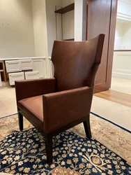 Pair of Christian Liaigre for Holly Hunt Leather wing back Chairs. The chairs are in good preowned condition. The...