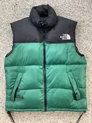 Vintage The North Face down puffer vest large. Very good vintage condition Size tag is faded but I believe it is a...