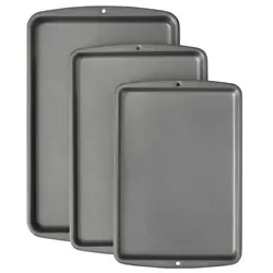 Cookies are just the beginning of what you can make with this value set of Wilton non-stick baking pans. A durable...
