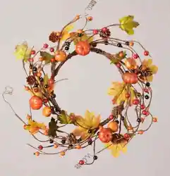 Pumpkins, Berries, Twigs and Pine Cones Candle Ring / Wreath. Orange pumpkins, accented with autumnal colored pip...