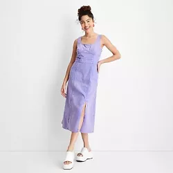 •Corset-style sleeveless denim dress •Made from 100% cotton in violet •Square neckline •Side zipper •Leg slit...