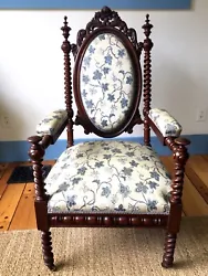 Gothic Revival Arm Chair from an estate in Vermont in excellent condition! The upholstery is cream with blue veined...