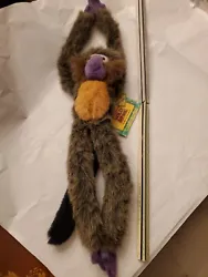 This monkey is with tags but is pre-owned. The batteries in the plush need to be replaced but it does make sounds. The...