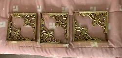 Brass wall shelf brackets that are great for handling any shelves and are unused