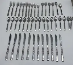 Elevate your dining experience with this vintage Northland Stainless Korea flatware set that includes a spoon and fork....
