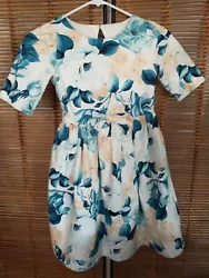 UP FOR YOUR CONSIDERATION IS THIS GORGEOUS BLUE ROSE DRESS WITH A KEY WHOLE BACK SO BEAUTIFUL EVEN MORE BEUTIFUL ON!...