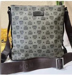 This is an authentic MCM Crossbody Bag, perfect for adding a stylish flair to any outfit. Made with high-quality...