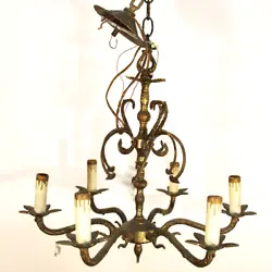 PRODUCT FEATURES Very old and stunning spanish brass chandelier with thin branch arms and leaf-cut bobeche, nearly...