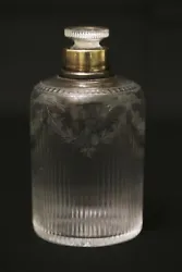 Antique perfume bottle dating back to the first half of the 19th century. Precious and elegant object, made of blown...