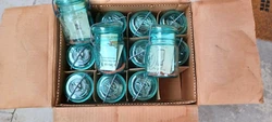WELL HERE WE HAVE A 1 PINT 1776-1976 IDEAL AQUA BLUE WIRE BAIL TOP MASON JAR . WE JUST TODAY FOUND A NEW UNUSED CASE...