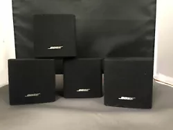 Set of four (4) BOSE single cube speakers.