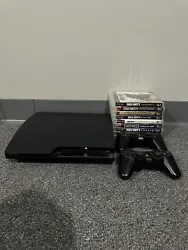 Sony PlayStation 3 Slim with (2) Controllers and (9) Video Games