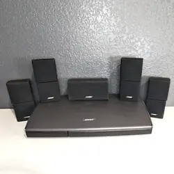 5 speakers (4 jewel cube dual speakers + 1 center channel. iPhone dock. One speaker has glue on the back of it (see...