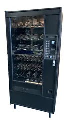 Automatic Product 4-column AP112 snack vending machine. This machine has been fully stripped down and repainted. They...
