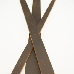 Buffalo hide Leather. Crazy Horse has a very nice pull up look when bend, and will darken when rubbed down. 1/8