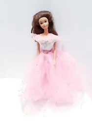 Mattel Barbie 1966 Pink Shiny Dress Brown Hair. Condition is used. Good for its age. The dress has staining as seen on...