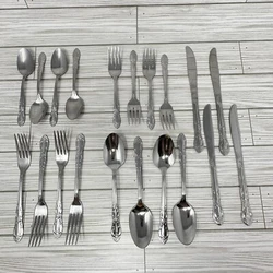 Large Spoons. Salad forks. Dinner forks. Will have scuffs and scratches from use and washing.