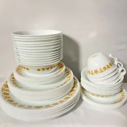 These place settings feature the popular Corelle Butterfly Gold pattern -- so much fun and oh so 1970s.