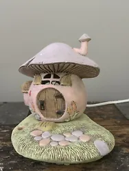 Ceramic mushroom cottage table lamp/night light. I got this from an antique store. Very adorable little lamp, pastel...