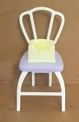 Midges Happy Family. 2003 Grandmas Kitchen B9880. 1 purple and white chair with a yellow baby booster seat. The chair...