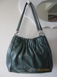 The photos of the inside are not the exact color because the flash kept going off. The inside is almost as dark a shade...