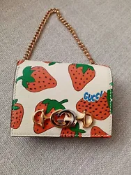 GUCCI Bi-Fold Wallet Zumi Chain Leather 570660 Strawberry Purse. This item is an excellent condition only used a couple...