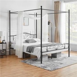 Romantic&Elegant: This metal-framed bed showcases arched headboard, metal scrollwork and four canopy posts, bringing an...