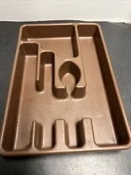 This is a cutlery tray made by Rubbermaid. It has 5 slots.