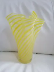 It has yellow and white swirls and is approx 9.25