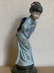 Lladro Sayonara Porcelain Figurine Japanese Girl Geisha 10 1/2” Tall. In good condition