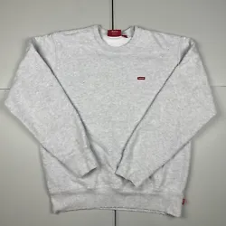 This is a stylish Supreme Mini Box Logo Crewneck Sweatshirt in the color gray and size M. It features a crew neckline...