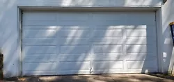 For sale I have a garage door 15x7 in white. It comes with a motor which worked fine before it was dismantled. There is...