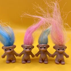 Trolls are believed to be good luck. Troll dolls were created in 1959 by Danish fisherman and woodcutter Thomas Dam....