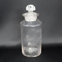 This is an antique, hand blown apothecary jar. You can see where the glass was 
