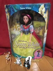 Walt Disneys Snow White and the Seven Dwarfs Doll by Mattel - Gown turns into village dress - New in Box.  Dolls comes...