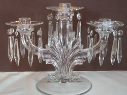 Offered is a lovely vintage 3 arm candleholder measuring 9.5 inches tall, complete with bobeches and prisms.