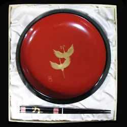 WAJIMA-NURI LACQUERWARE. Lovely lacquerware bowl, black outer rim and back, the bowl. RED AND BLACK CRANE BOWL. gold...