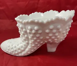 This unique candy dish is a charming addition to any collection.